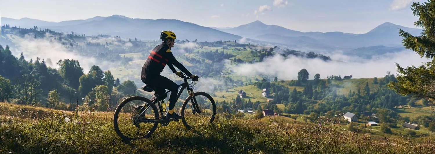 Cycling through open countryside